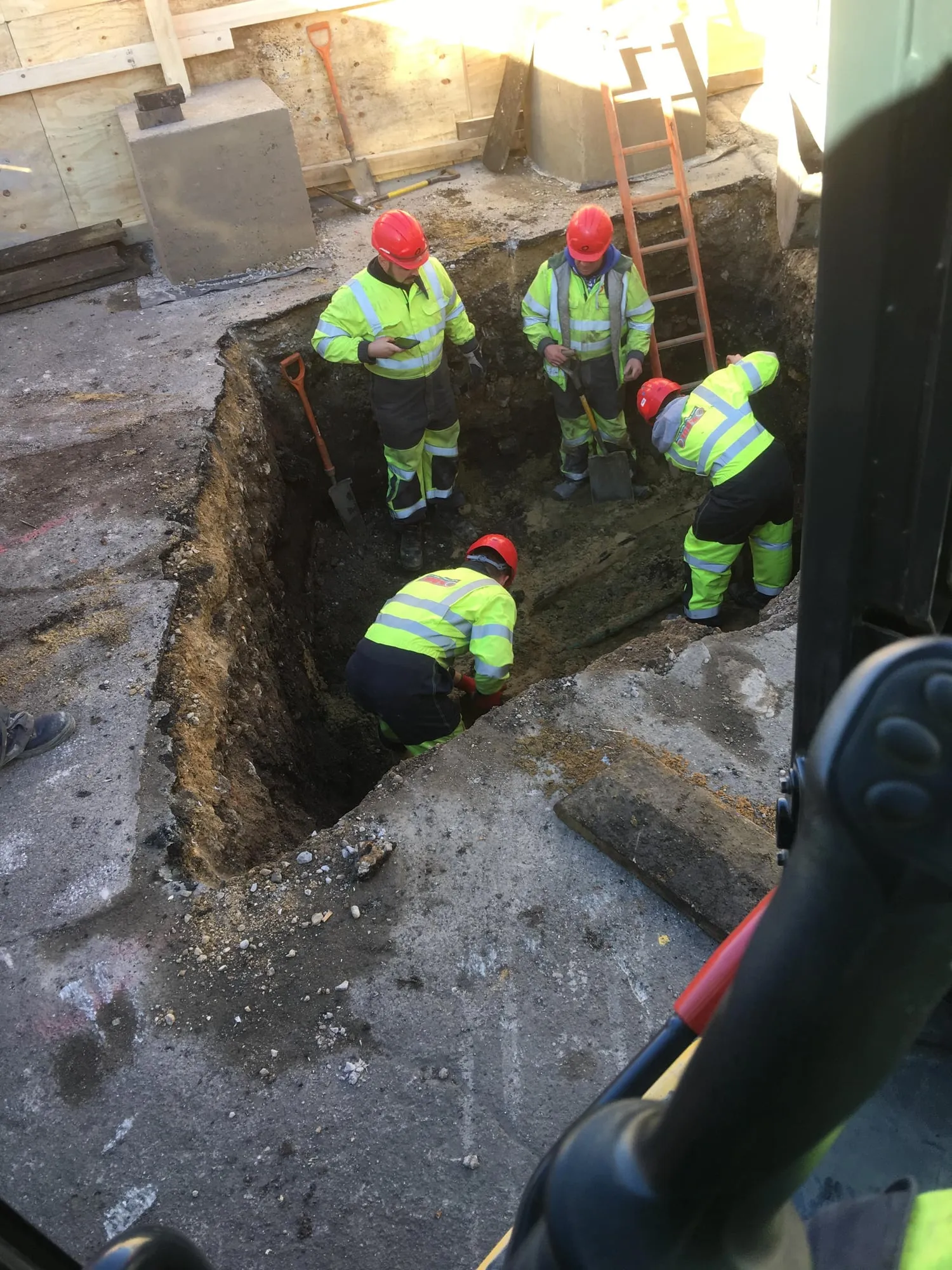 Timber trench support in a deep utility excavation